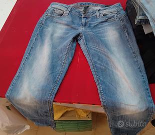 stock pantaloni donna 