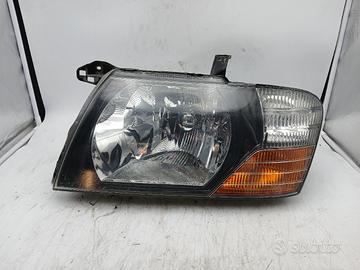 Faro ant sx MITSUBISHI PAJERO II '03