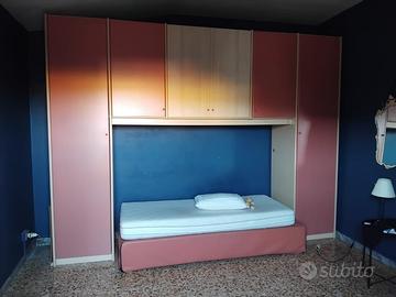 Armadio da camera con letto