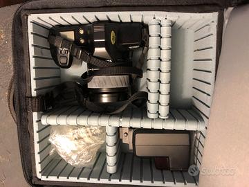 macchina fotografica e flash