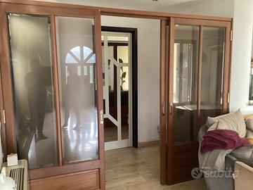 divisorio con porta scorrevole