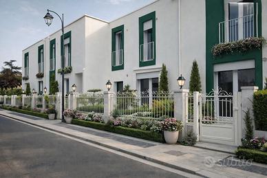 Ville a schiera bilivelli di pregio con giardino