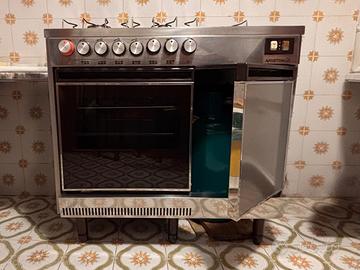 cucina gas acciaio ariston 4 fuochi forno +piastre