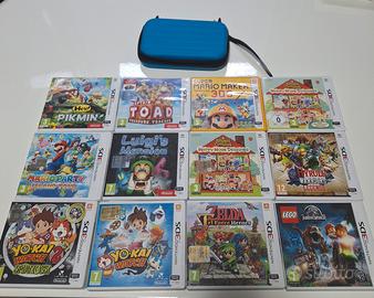 11+1 giochi 3ds + porta console e schedine blu