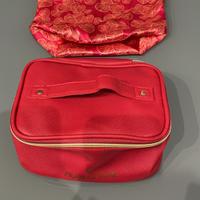 Beauty case rosso e rosa