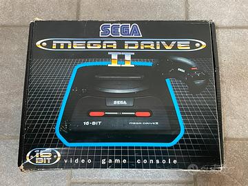 Sega Mega Drive 2 console con scatola e manuali