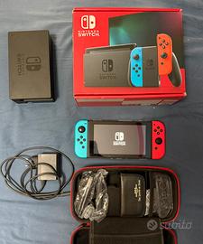 Nintendo Switch pari al nuovo + scatola + 2 giochi
