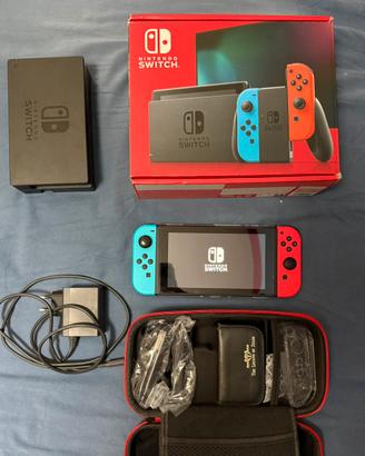 Nintendo Switch pari al nuovo + scatola + 2 giochi