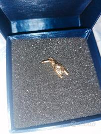 Ciondolo  rock oro 750 con certificato 
