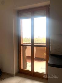 INFISSI IN LEGNO CON DOPPI VETRI