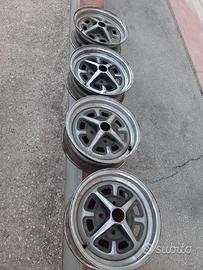 4 cerchi originali CROMATI IN FERRO MG-B 6X14