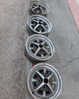 4 cerchi originali CROMATI IN FERRO MG-B 6X14