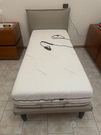Letto  con comando elettrico per alzata