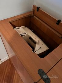 Macchina da cucire a scomparsa in mobile integato