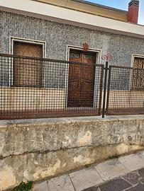 Casa, terra, cantina e box auto in centro storico