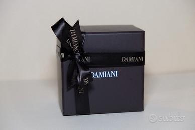 Gemelli D.Side Damiani in acciaio e onice con dett