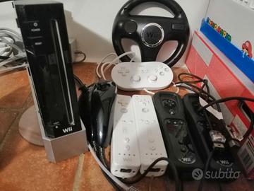 Nintendo Wii, 4 controller, accessori e 15 giochi
