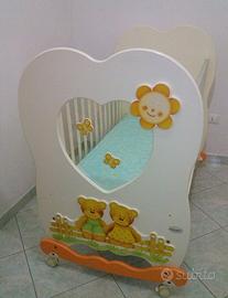 Culla+ paracolpi+ materasso e abbigliamento 