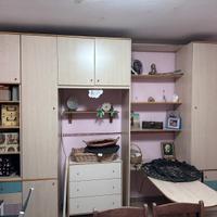 camera con scrivania incorporata