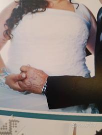abito da sposa romantico con corpetto ricamato.