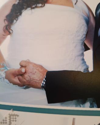 abito da sposa romantico con corpetto ricamato.