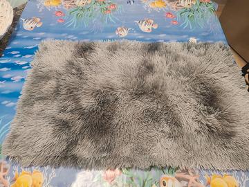 Tappeto di pelo mastro bianco