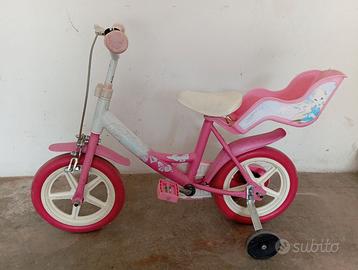 Bicicletta bambina con rotelle e seggiolino bambol