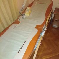 lettino massaggiante con pietre di giada e rulli