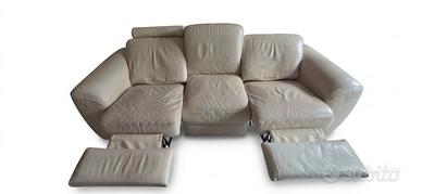 Divano Doimo in pelle tre posti due recliner