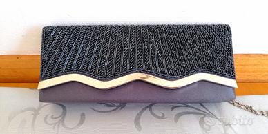 Pochette azzurro carta da zucchero nuova