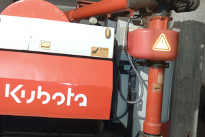 Mini mietitrebbia cingolata Kubota