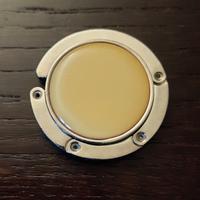 Elegante appendi borsa da tavolo