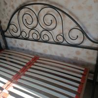 rete ortopedica nuova,e letto in ferro battuto 