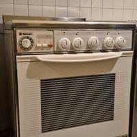 cucina a gas a 4 fuochi e forno