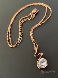 Collana con pendente a spirale e cristallo