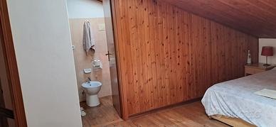 Camera e bagno privato in mansarda