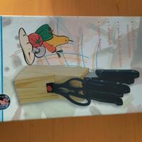 ceppo legno con coltelli