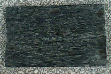 Rivestimento rustico in marmo verde e giallo