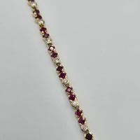 BRACCIALE TENNIS IN ORO CON RUBINI E DIAMANTI