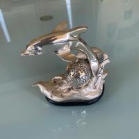 Mini scultura in lamina d’argento.