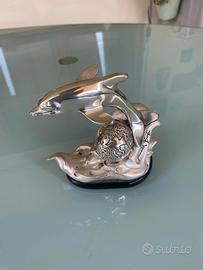 Mini scultura in lamina d’argento.