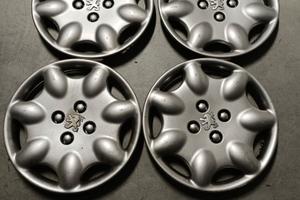 Set 4 Copricerchi Borchie Originali Peugeot 106 -