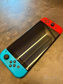 Nintendo switch OLED + 3 giochi+controller+acces