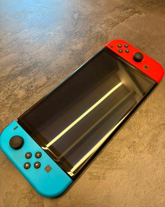Nintendo switch OLED + 3 giochi+controller+acces