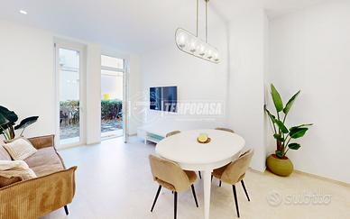 APPARTAMENTO PARI AL NUOVO CON AMPIO GIARDINO !!