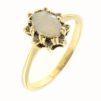 Anello oro giallo 14kt e opale