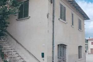 Appartamento + più locale commerciale