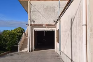 IMMOBILE CON DUE UNITA' ABITATIVE GIARDINO ESCLUSI