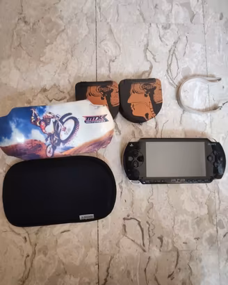 PSP Value Pack + giochi, film UMD e accessori