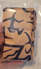 k-pop Hunter tatuaggi braccia 